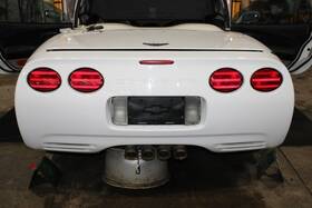 190-1758 Chevrolet 97-04 Corvette White Rear Bumper Cover Taillight Absorber Backup Lamp Assembly