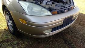 105-01402a Ford Front Bumper Sedan With Fog Lamps Fits 00-04 Focus 276839