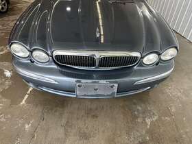 C2s11349 Jaguar 02-03 Xtype Front Bumper Cover With Headlamp Washer Option Titanium Blue Lgl