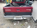 95-04 Toyota Tacoma Rear Bumper Assembly Chrome Dent. Fixed Price $337.49.
