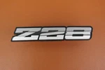 1985-1987 Chevy Camaro Z28 Nos Gm Rocker Panel Silver Emblem # 20554148 20313783. Fixed Price $49.99.