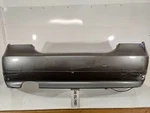 2004-2007 Bmw 525I 545I 550I Rear Bumper Cover W/o Sensor Holes Genuine Oem. Fixed Price $250.00.