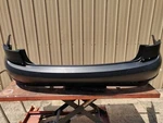 561807421KGRU VW1100209 Rear New Bumper Cover For Volkswagen Passat 2016-2018. Fixed Price $300.00.