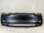2022-2023 Tesla Model Y Front Bumper Cover W/o Sensor Holes Oem. Fixed Price $300.00.