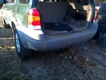 Rear Bumper Xlt With Wheel Lip Moulding Fits 01-04 Escape 3241913. Fixed Price $85.00.