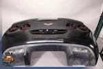 2006 Chevrolet Corvette C6 Rear Bumper Assembly W/ Spoiler Black Oem. Fixed Price $874.95.