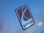 Front Bumper Emblem Sedan Fits 00-02 Saturn Series 99615. Fixed Price $38.00.