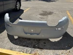 Used 2012-16 Porsche Rear Bumper With Sensor Holes 99150541101/03 (primed). Fixed Price $499.99.