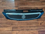 Oem 2007-2009 Suzuki Reno Front Bumper Grille Cover Blue Chrome 96408513. Fixed Price $159.99.