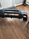 Front Bumper Cover Fits 2001-2004 Ford Escape With Fog Lamp Holes Textured. Fixed Price $50.00.