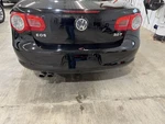07-11 Vw Eos Rear Bumper Cover Black LO41. Fixed Price $200.00.