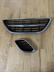 2003-2007 Saab 9-3 Oem Front Grille Set Center And Right 12787224 12787225. Fixed Price $58.35.