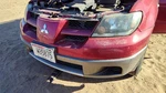 2003-2006 Mitsubishi Outlander Front Bumper Cover Assembly Oem Red MN133214. Fixed Price $427.43.
