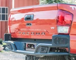 Body Armor TC-2962 Desert Series Rear Bumper For 16-21 Toyota Tacoma. Fixed Price $777.00.