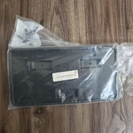 New Oem Ford Transit V363 Front License Plate Bracket. Fixed Price $28.00.