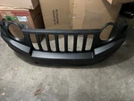 Front Bumper Cover For 2007-2010 Jeep Compass Mk Primed. Fixed Price $140.00.